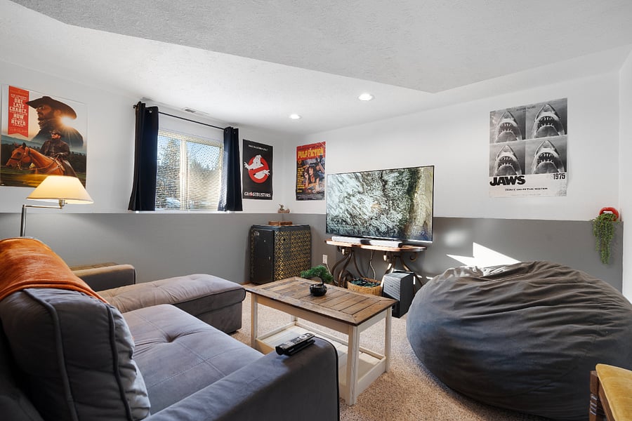 Snuggle up in our cozy movie theater, featuring a 65-inch smart TV with an Alexa soundbar, room-darkening curtains and blinds, and dimmable lights.