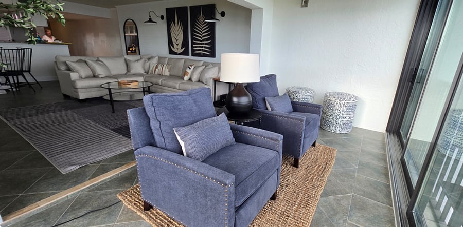 Lanai with living room, dining area, and kitchen