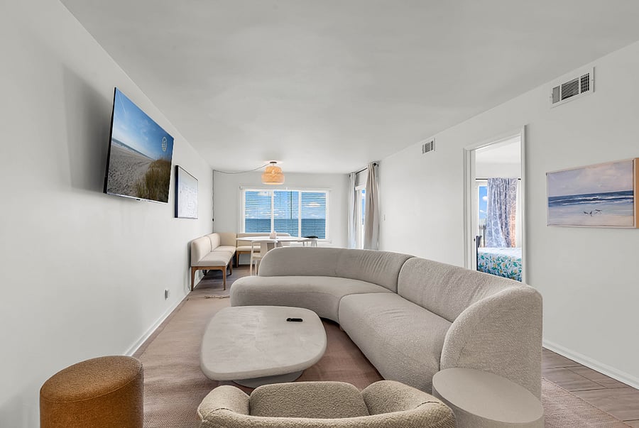Relax in the living room with Smart TV entertainment and stunning ocean views.