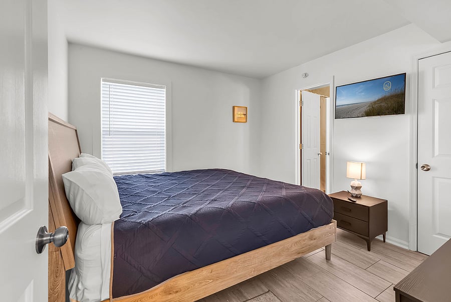 Boutique-style guest bedroom with a king mattress and Smart TV for private comfort and convenience.