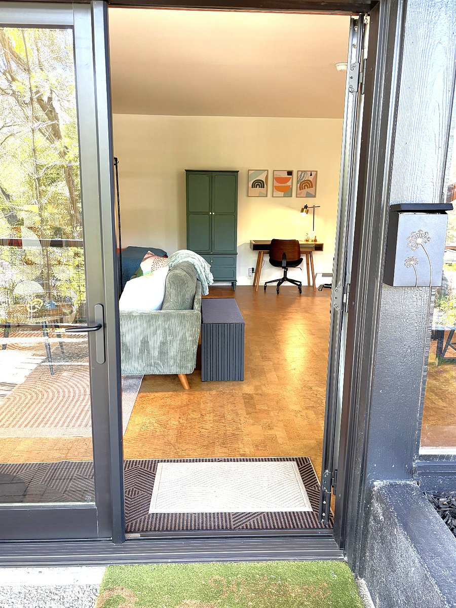 Entry bench, armoire, desk/lamp, electric baseboard heating.
