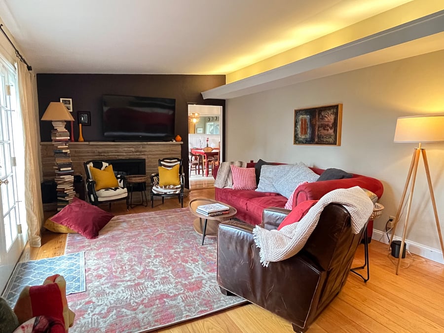 Shared living room w smart tv and gas fireplace