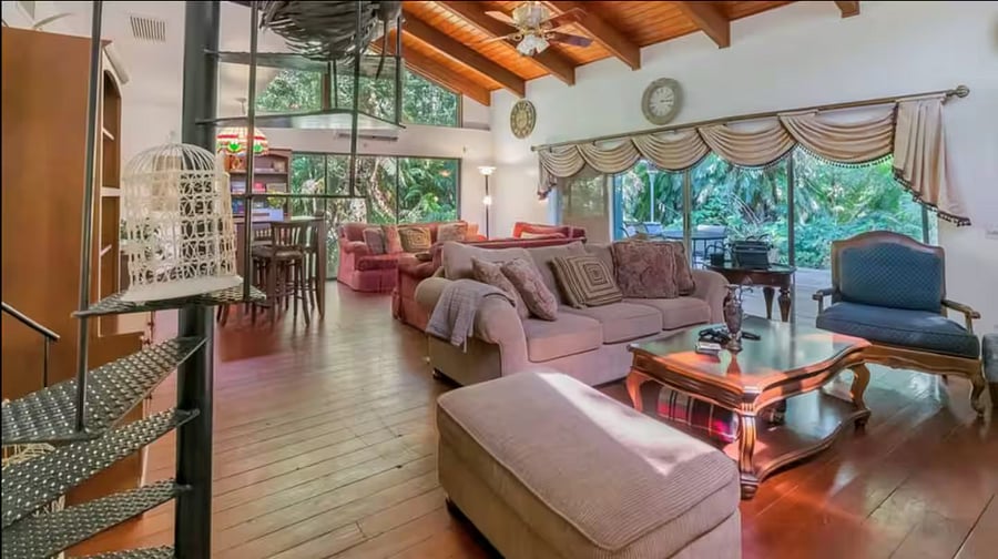 Living Room is large with lots of comfy couches. The tv comes with a dvd player & Chromecast. An adjacent private deck with sunloungers and additional dining is located thru the sliding doors.