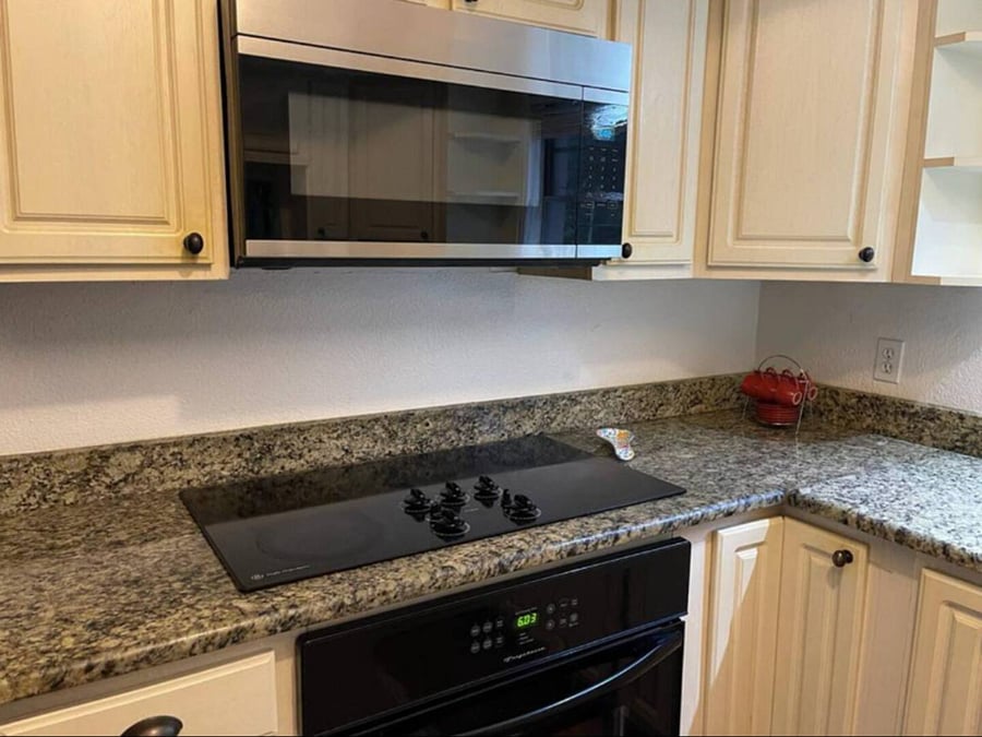 The full kitchen has a dishwasher, oven, stove top, microwave & refrigerator. A Brita water jug in the fridge and a countertop ice maker. It is fully stocked with pans, glassware, dishware & utensils.