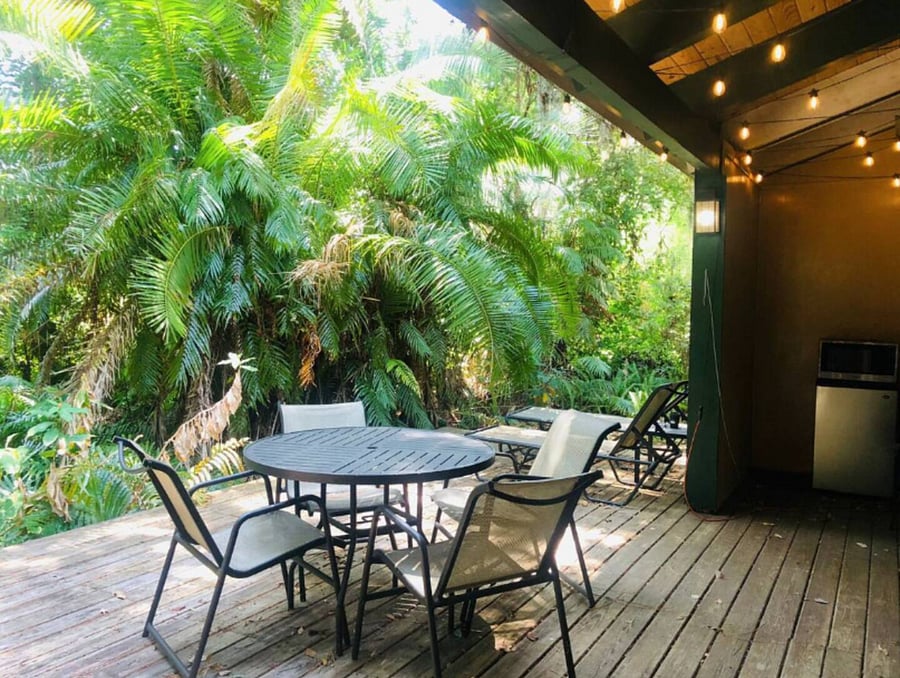 A wooden terrace is adjacent to the lounge are thru the sliding doors. A dining table & 2 sun loungers. Private & peaceful surrounded by tropical foliage.