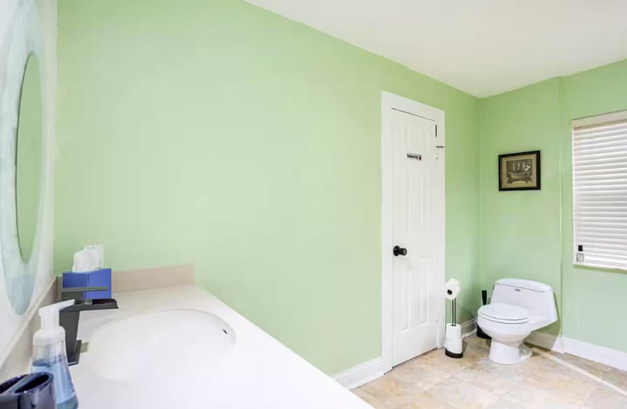 The 2nd floor unit bathroom consists of a sink, toilet and bathtub with shower. Towels, shampoo, conditioner and soap are provided.