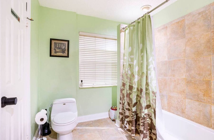 The 2nd floor unit bathroom consists of a sink, toilet and bathtub with shower. Towels, shampoo, conditioner and soap are provided.