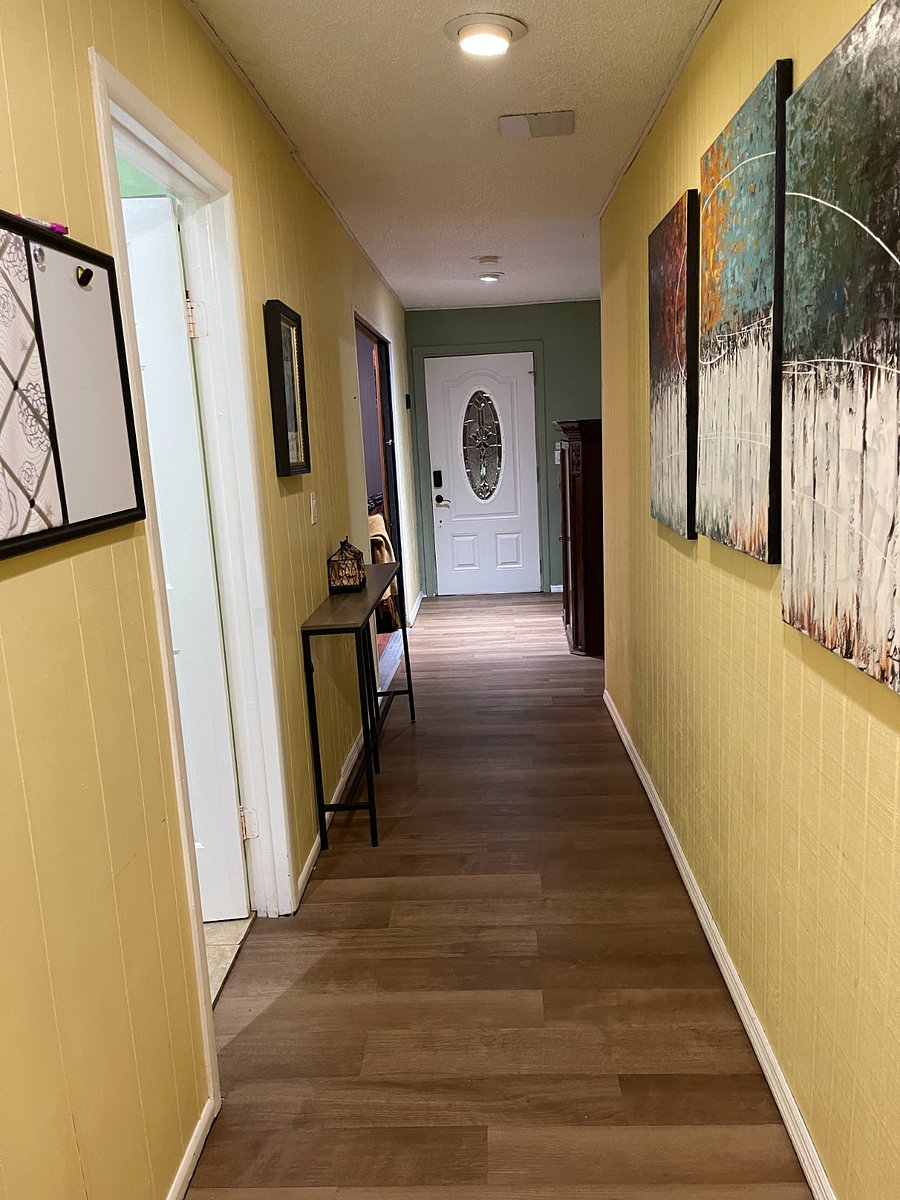 The 2nd floor hallway leads to two bedrooms, and either a fourth bedroom or, 2nd living room and a full bathroom.