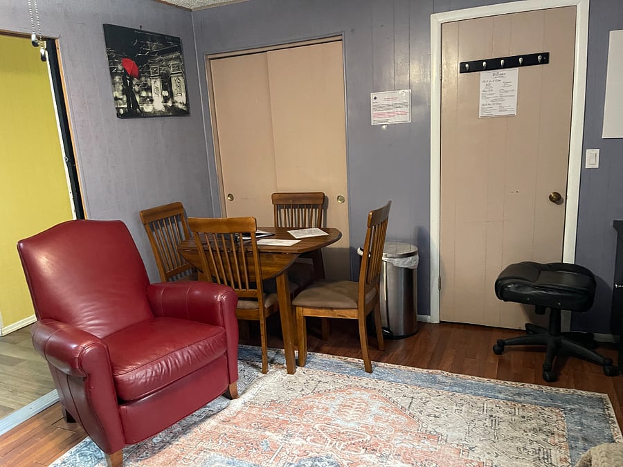 The 4th bedroom can either be configured as a bedroom with a Queen size bed. Or, can be configured as a 2nd living room/office with a couch, armchair, ottoman & dining table. A mini fridge, microwave and single serve Keurig machine.