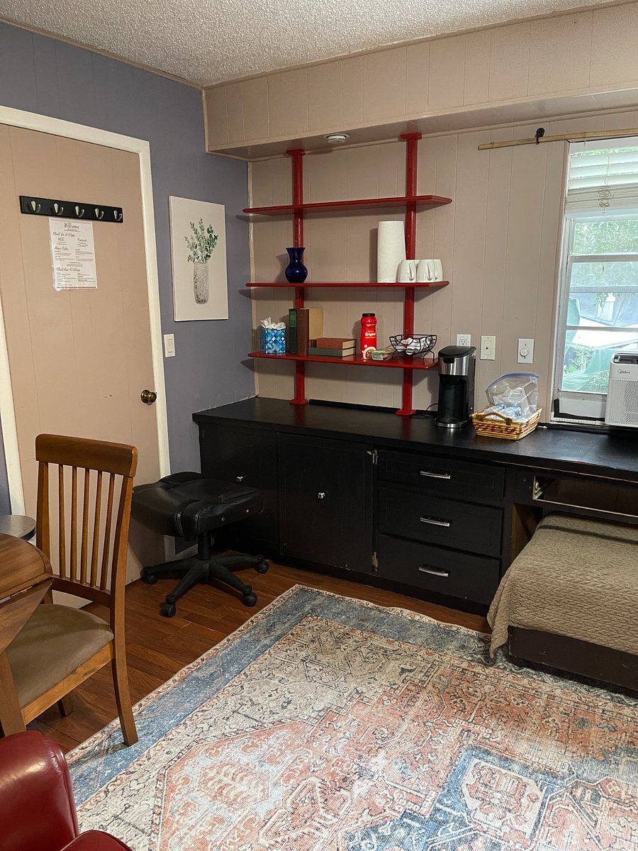 The 4th bedroom can either be configured as a bedroom with a Queen size bed. Or, can be configured as a 2nd living room/Office with a couch, armchair, ottoman & dining table. A mini fridge, microwave and single serve Keurig machine.