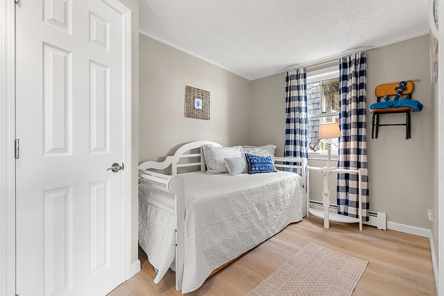 This bedroom has a very comfortable twin bed and a trundle under
