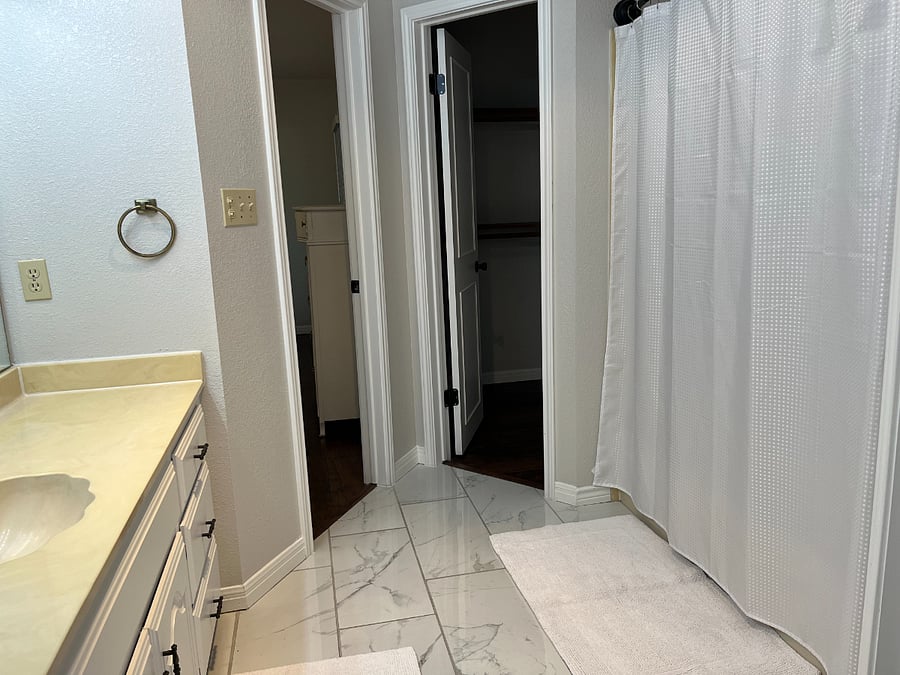 Master Bath with 2 separate closets and separate water closet