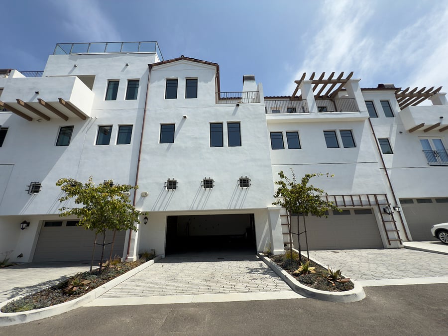 Photo of Villa showing 118 garage and the second and third levels above it.