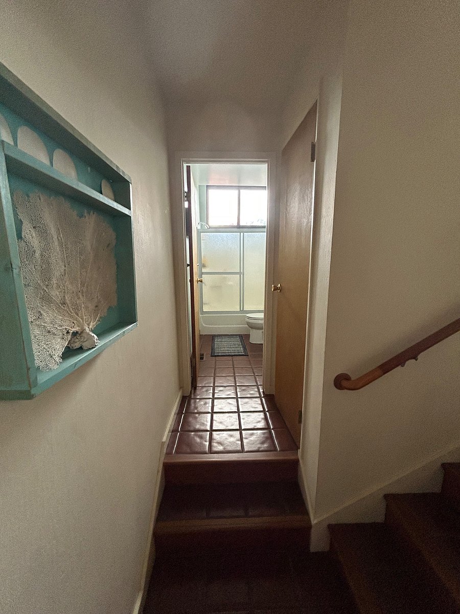 Second level bathroom. Two steps up.