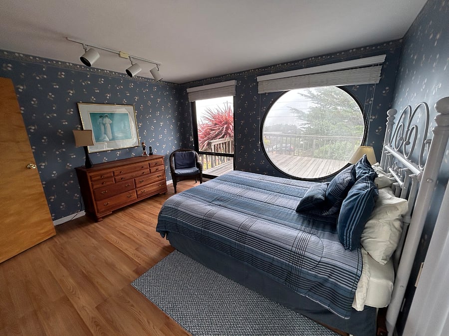 Second level bedroom with ocean view.