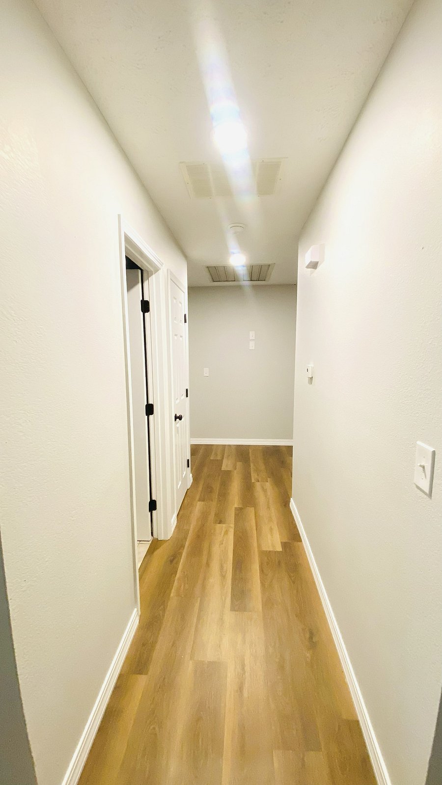 second hallway to bathrooms and bedrooms