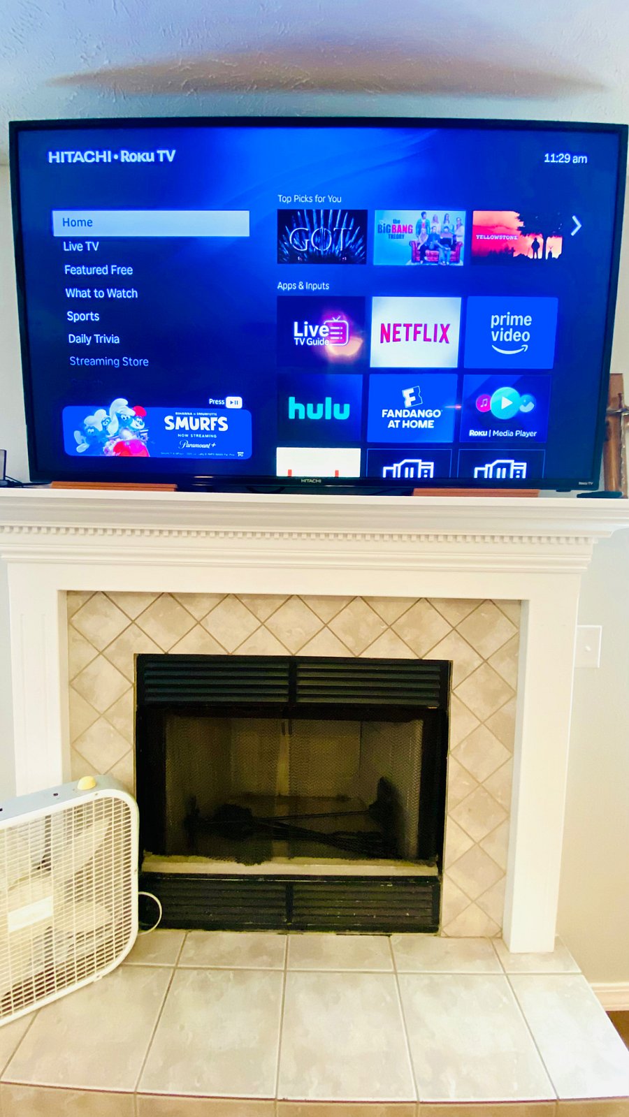 Living room with smart TV and Fireplace
