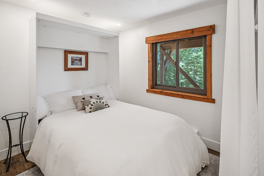 Queen bed in bedroom