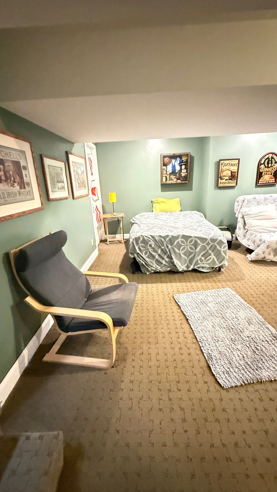 Additional bed in basement, with private bathroom and shower.