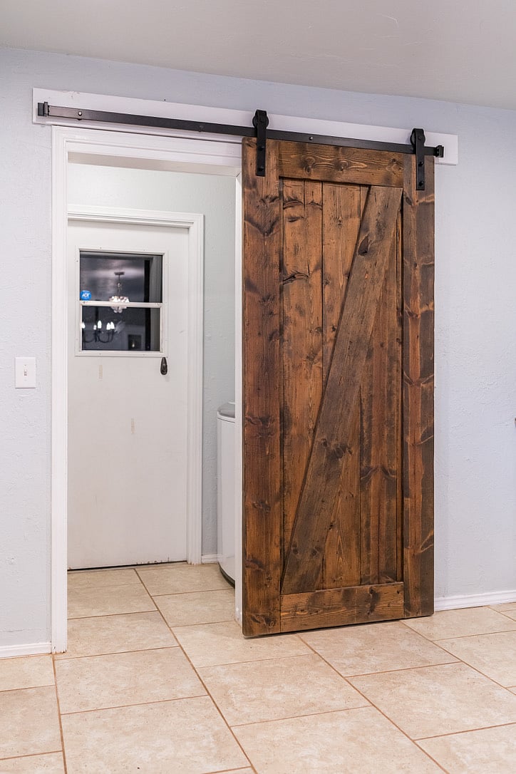 Laundry room with sliding door view from kitchen