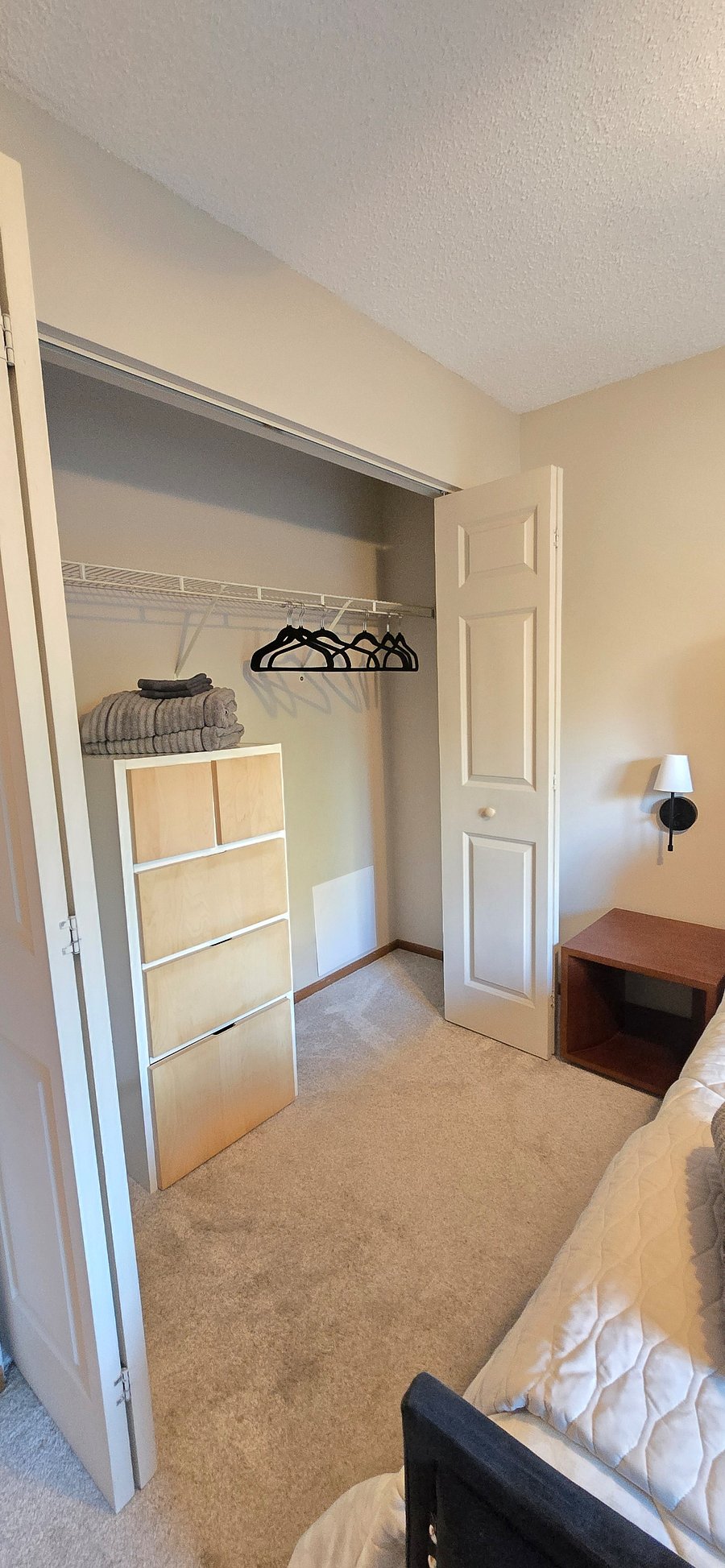 Master bedroom closet and dresser area.Keurig
