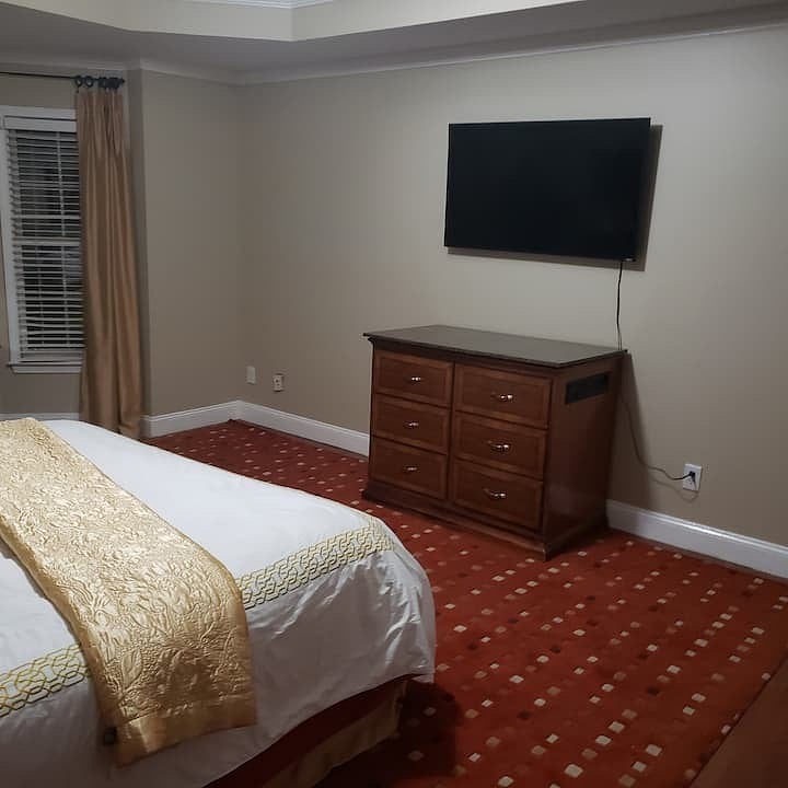 Bedroom #1 master bedroom with full Bath with smart tv