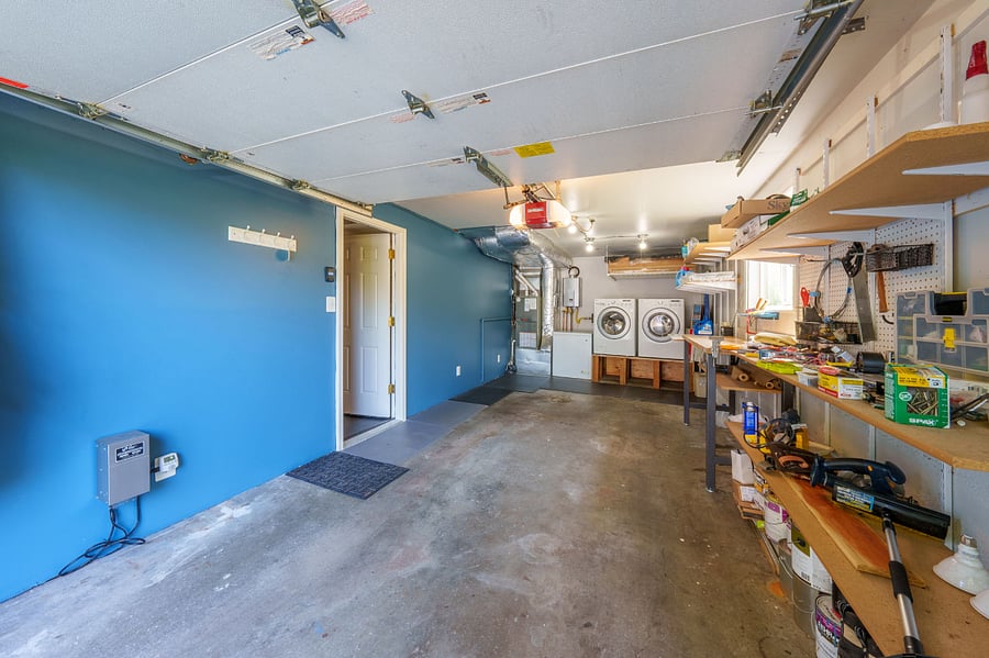 Single car garage, with access to the apartment using door on left side
