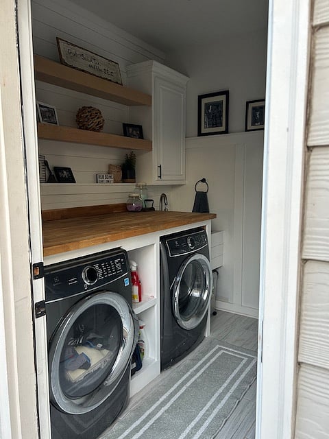 Access to the laundry room from the exterior of the house by the garage.