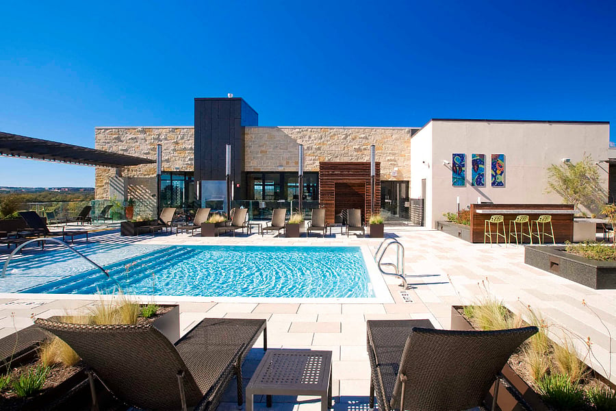 Rooftop pool with grills and townlake view