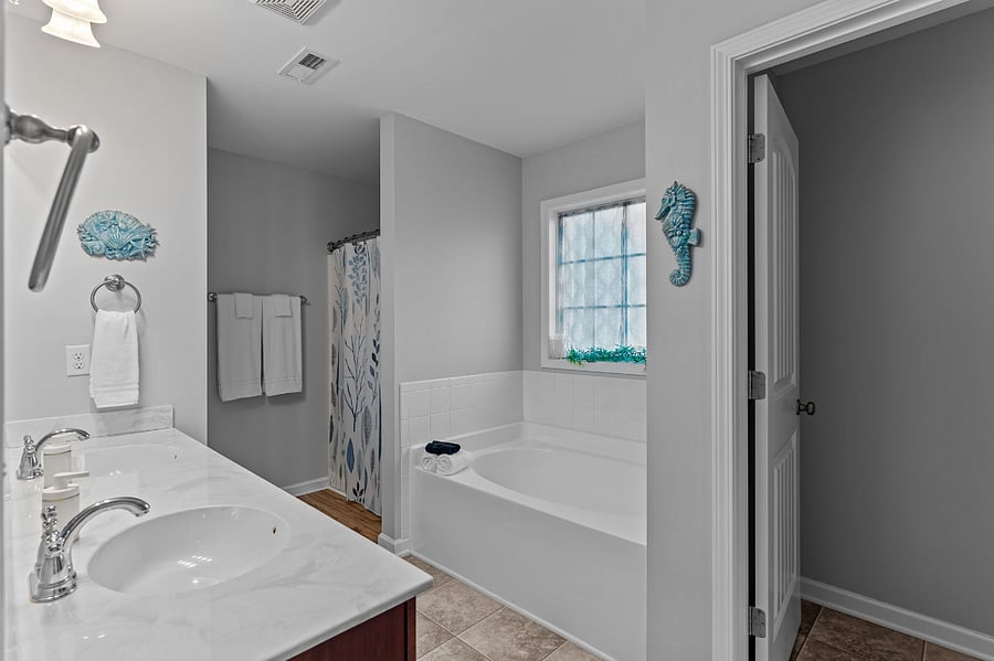 Primary Bath with walk-in shower, soaking tub and double vanities