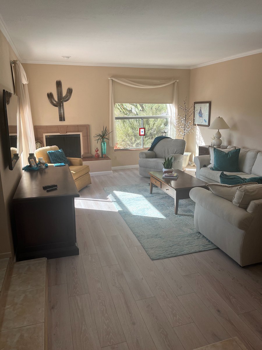 Living Room with TV and fireplace