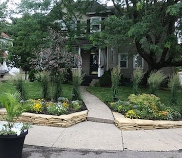 "Happy Little Flowers and Happy Little Trees" ....NO, we didn't have Bob Ross paint our place but we do have it professionally landscaped and well kept up.