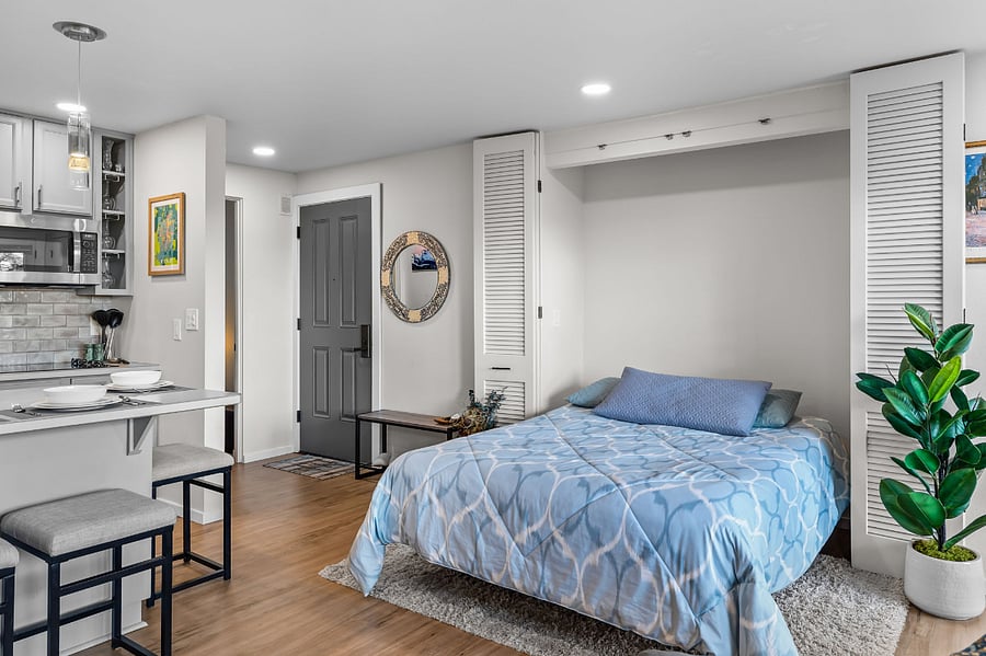 Queen murphy bed for guests, easily hidden away when not in use.