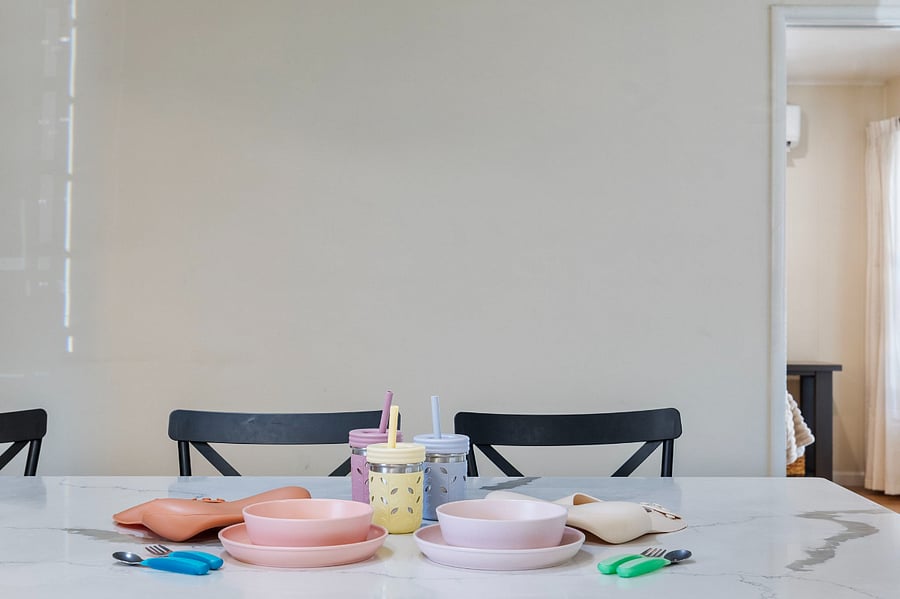 This cozy dining area is perfect for families, combining elegant design with kid-friendly features for a comfortable meal experience.