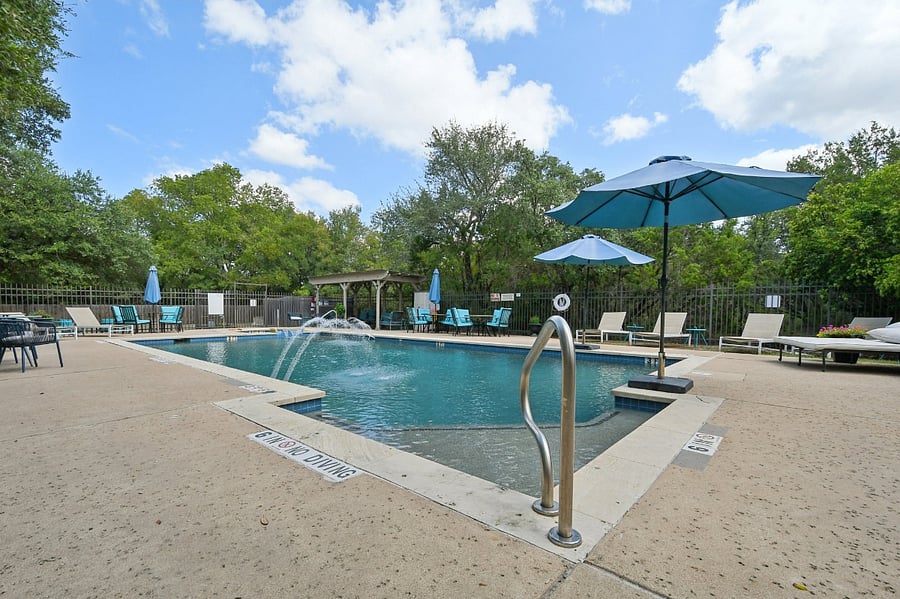 Community pool, hot tub, and patio
