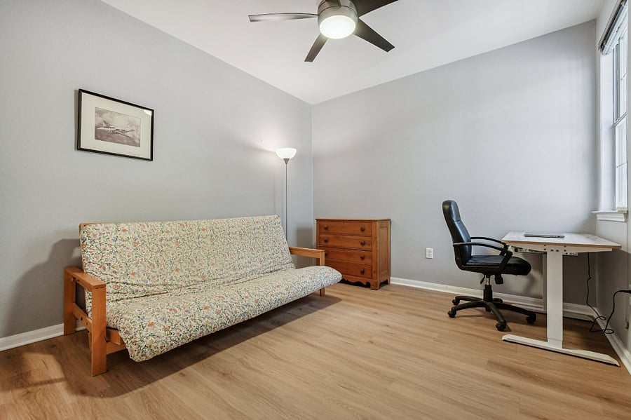 2nd bedroom, futon couch convertible to queen bed. Stand up desk.
