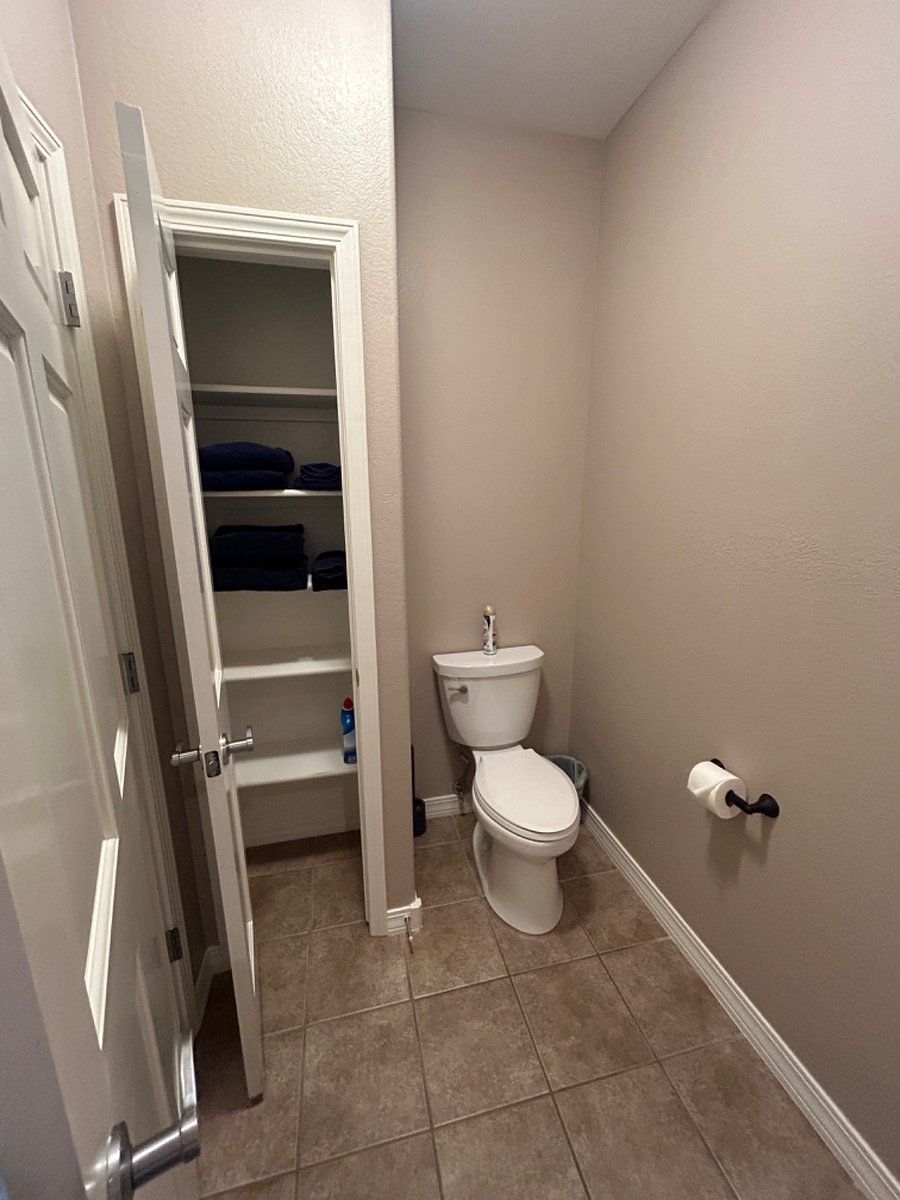 Master bathroom linen closet