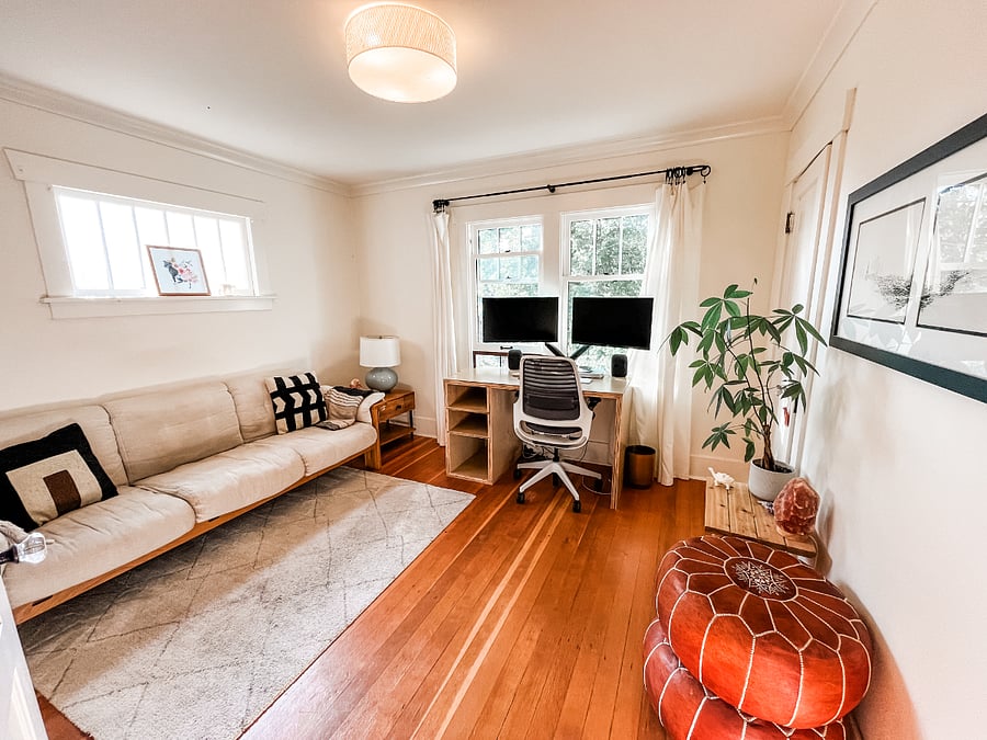 The office area is set up with a couch and a desk. This room faces south and gets ample daylight. The window overlooks the front of the house and is shaded by 100-year old London planetrees. 