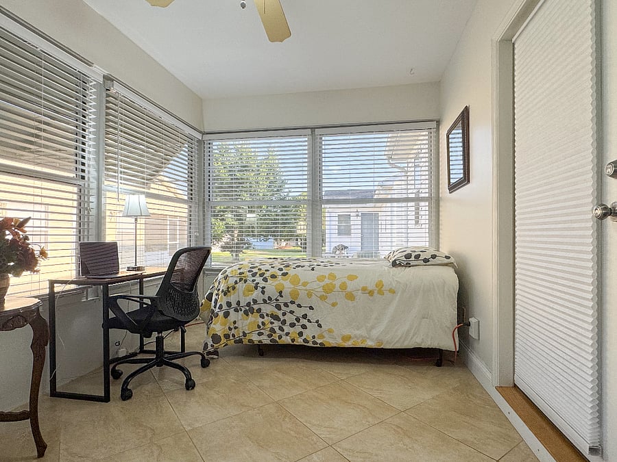 Third Bedroom/Florida room/Office has blinds for complete privacy. Central air/heating along with a portable heater and fan is perfect for a comfortable nights sleep on the twin bed.
