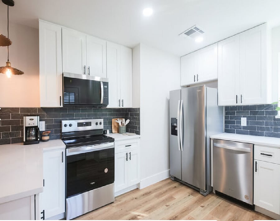Gorgeous, updated kitchen with all new appliances, fully stocked with kitchen essentials