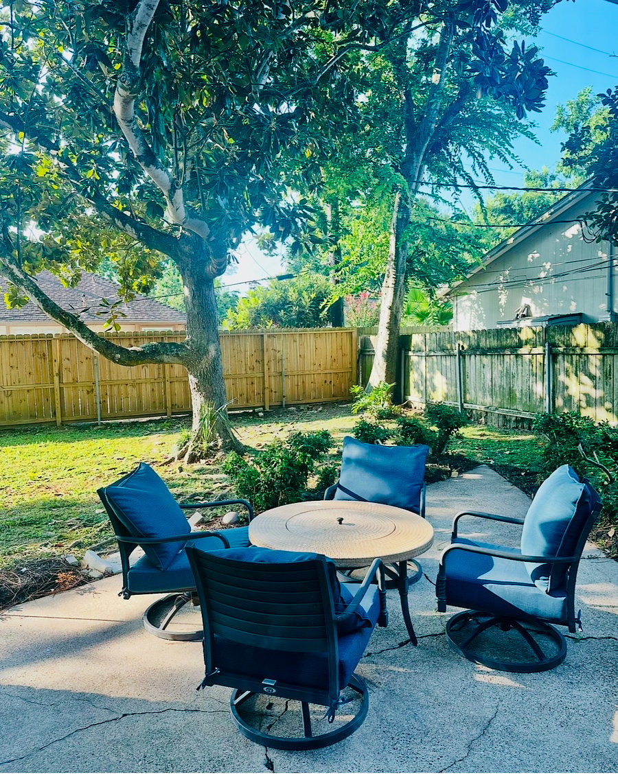Enjoy a glass of wine or morning coffee on the cozy back patio