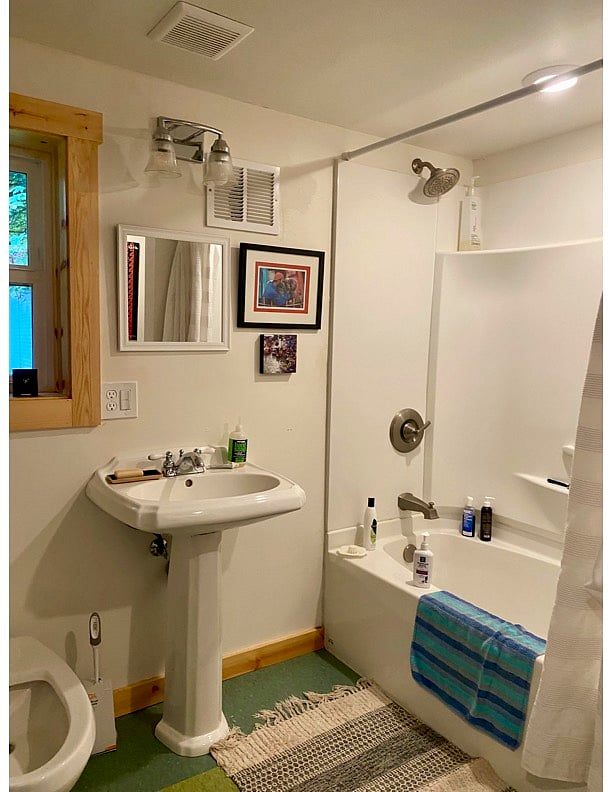 full bathroom with no-odor eco composting toilet. On demand hot water heater.