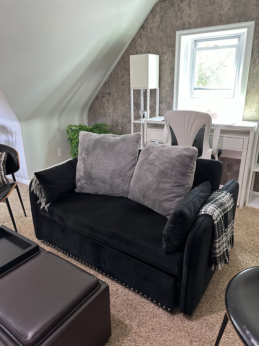 This is a sleeper sofa for guests or for lounging when watching television of the large screen smart tv in the living room.