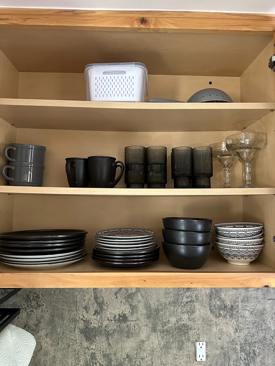 The kitchen is stocked with all the essentials, most items are brand new. Not shown but essentials also include pots, pans, and bakeware.