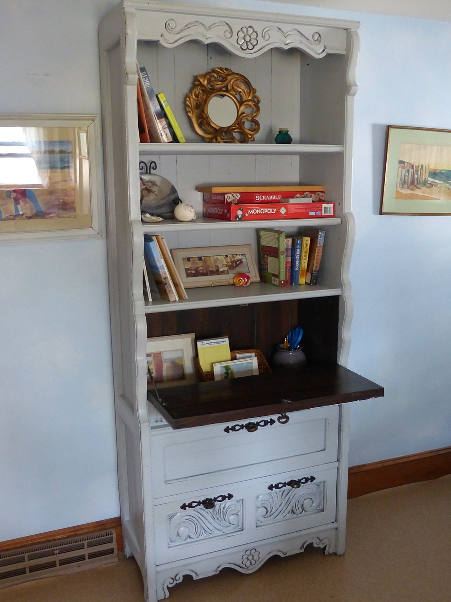 Bookcase has a dropdown desk.  Just the right spot to place a computer.