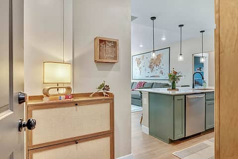 Welcoming entry with always-on ambient light and shoe storage cabinet. Don't forget to drop a note or small memento from your stay in the shadow box guestbook!