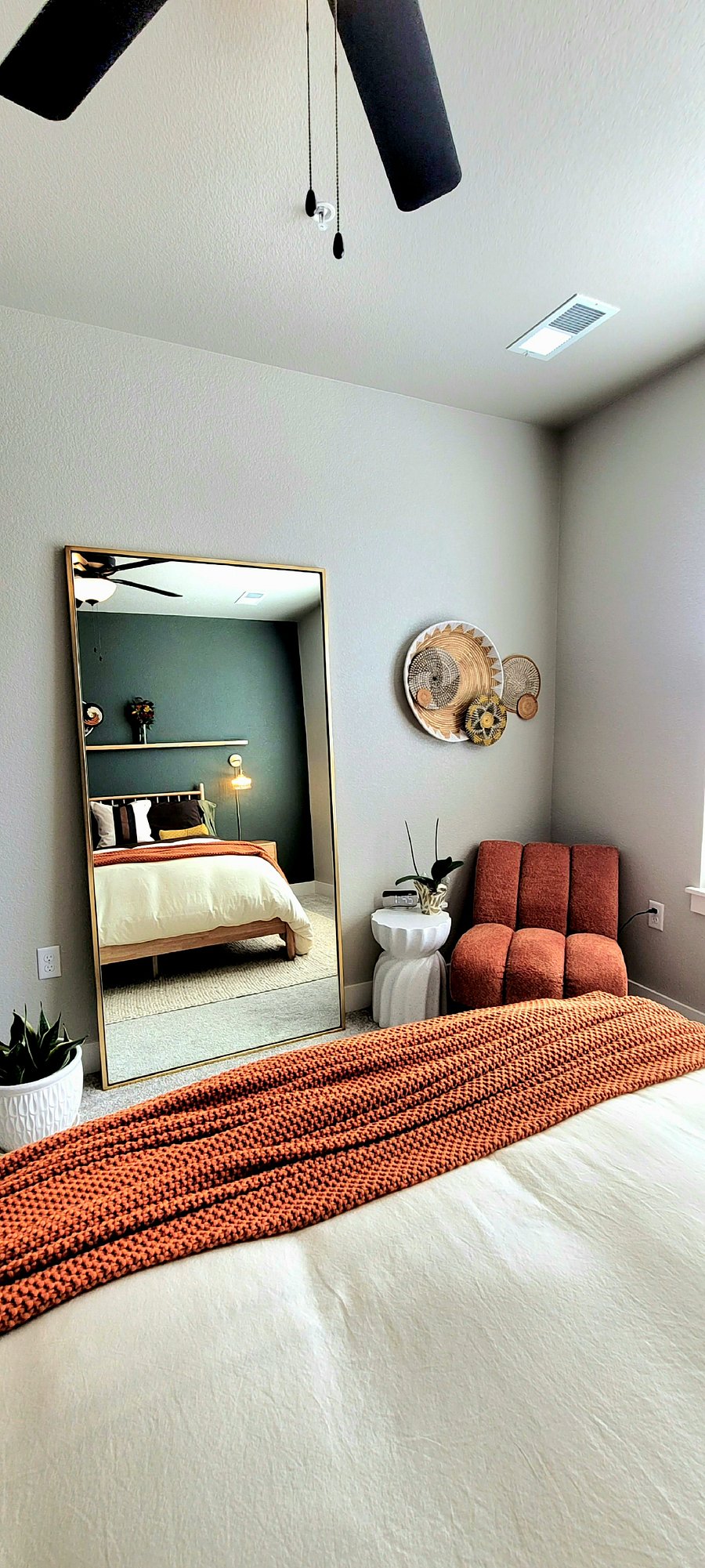 With the adjustable TV mount, watch TV from bed or the lounge chair while you look over the beauty of the serene primary bedroom suite.