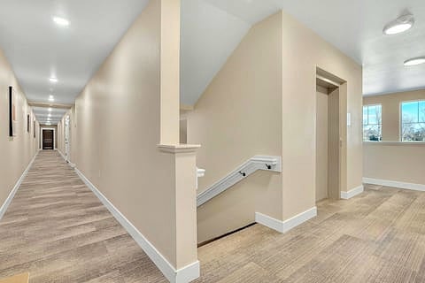 Bright internal shared hallways with courteous neighbors. Easy access to unit from main building entrance. The unit front door  is right at the top of stairs/beside elevator.