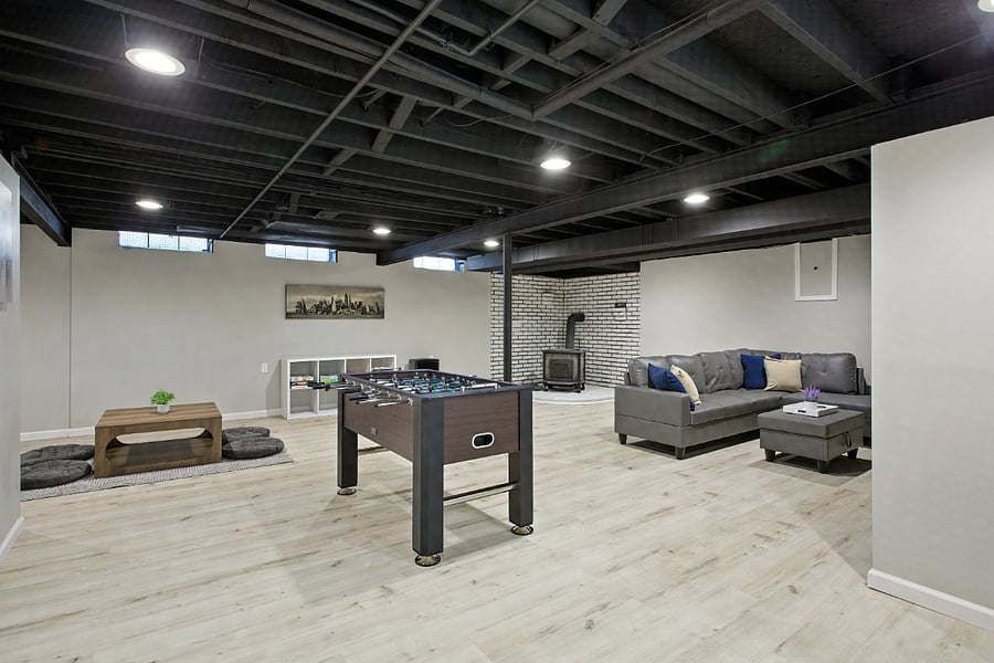 Basement Entertainment: foosball, board games, smart TV, sofa set