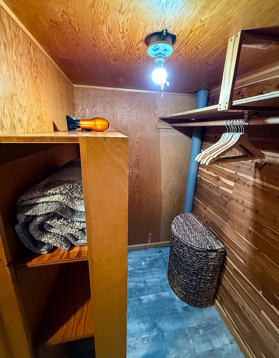The walk-in closet has plenty of room for your belongings.
